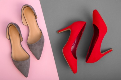 Different female shoes on color background