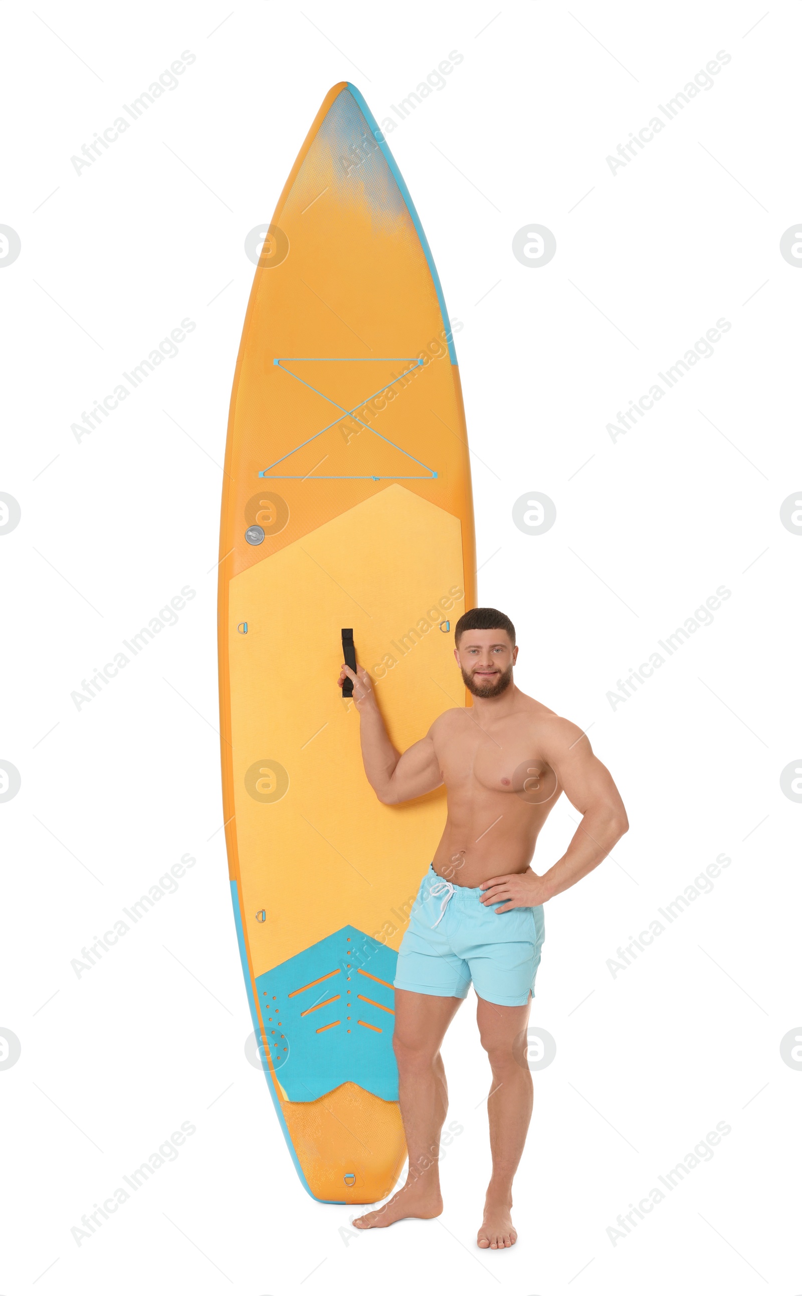 Photo of Handsome man with orange SUP board on white background