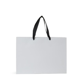 Photo of Paper shopping bag isolated on white. Mock up for design