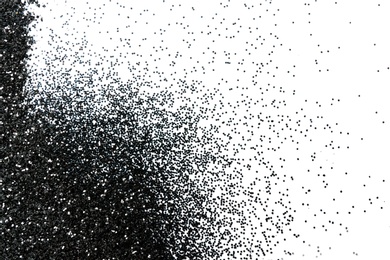 Shiny black glitter on white background, top view with space for text