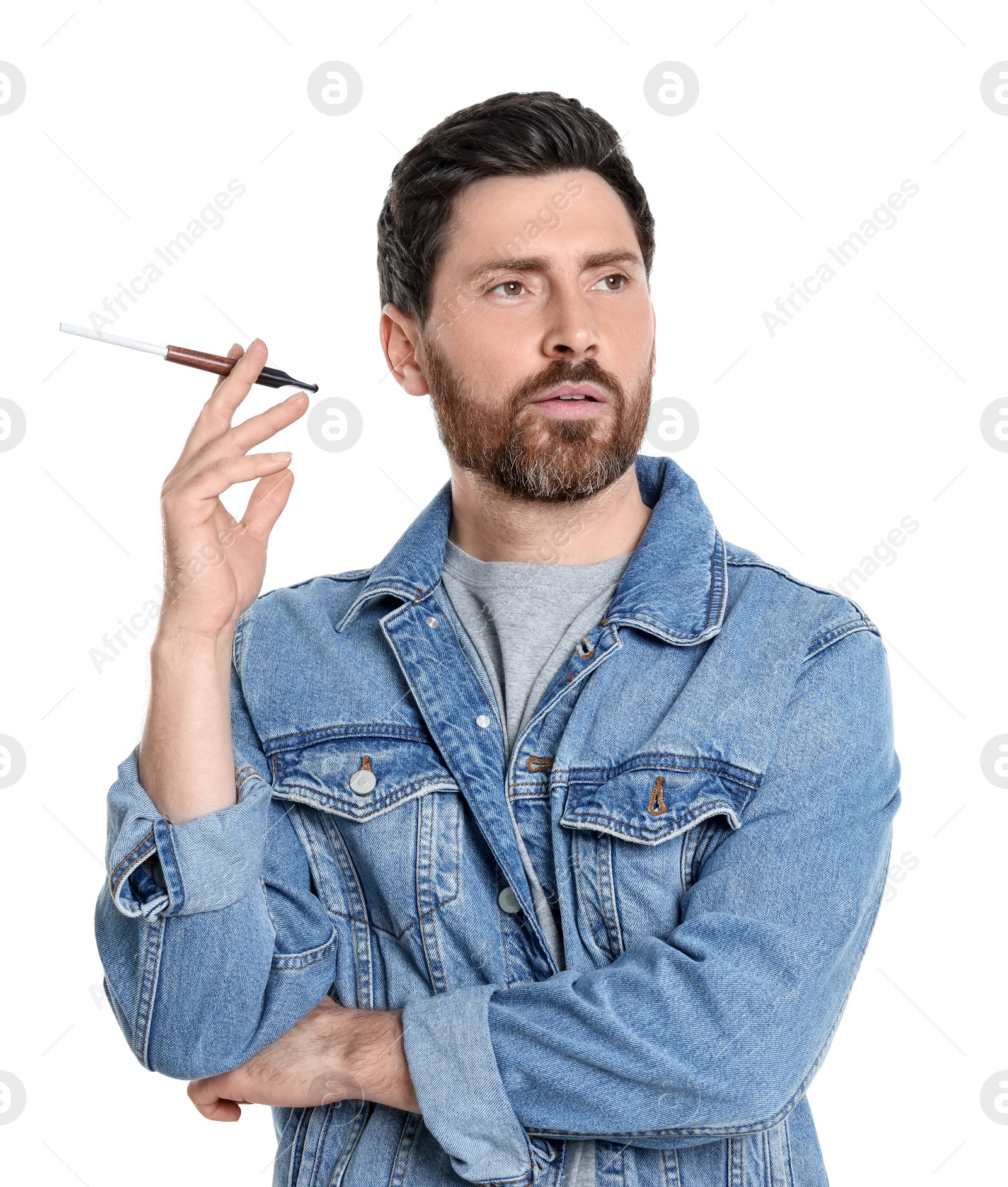 Photo of Man using cigarette holder for smoking isolated on white