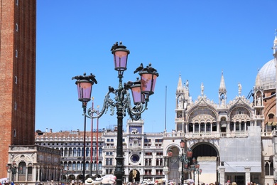 VENICE, ITALY - JUNE 13, 2019: Crowded Saint Mark's Square on sunny day