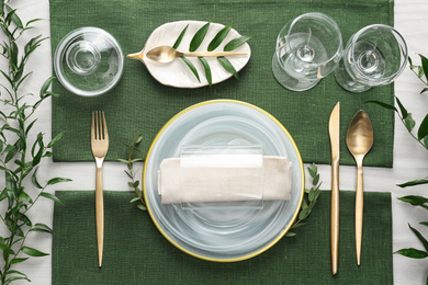 Photo of Elegant festive setting on white wooden table, flat lay