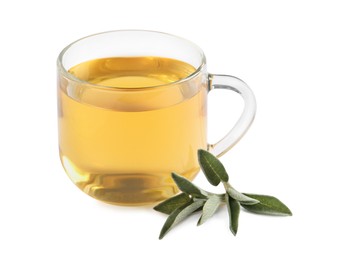 Cup of aromatic sage tea and fresh leaves on white background