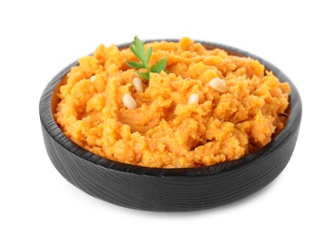 Photo of Plate with mashed sweet potatoes on white background