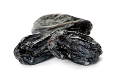 Tasty raisins on white background. Healthy dried fruit