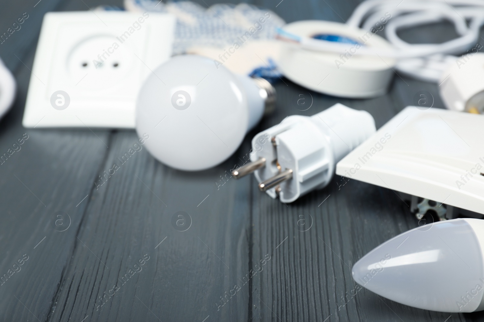 Photo of Set of electrician's equipment on wooden table