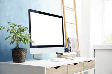 Comfortable workplace with modern computer on table