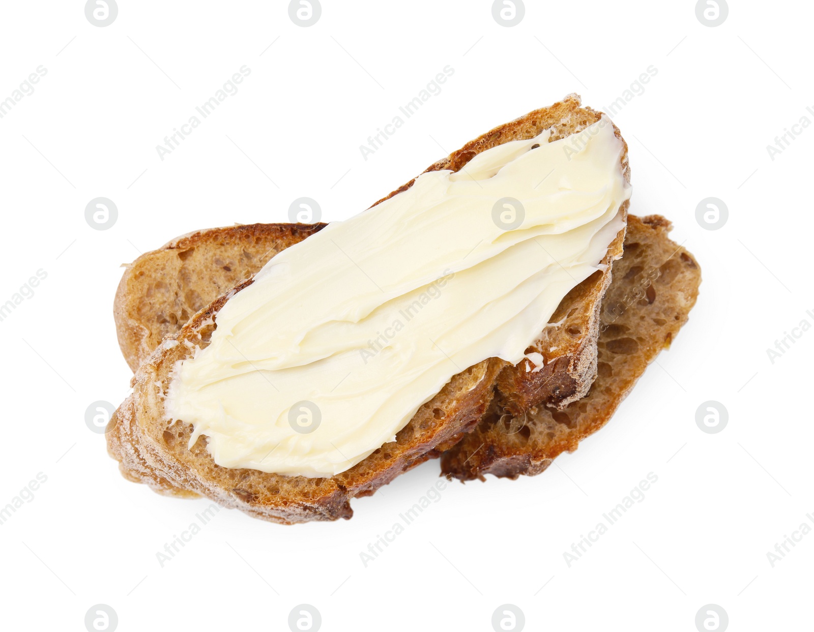 Photo of Slices of tasty bread with butter isolated on white, top view