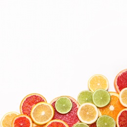 Photo of Fresh juicy citrus fruits on white background, flat lay. Space for text