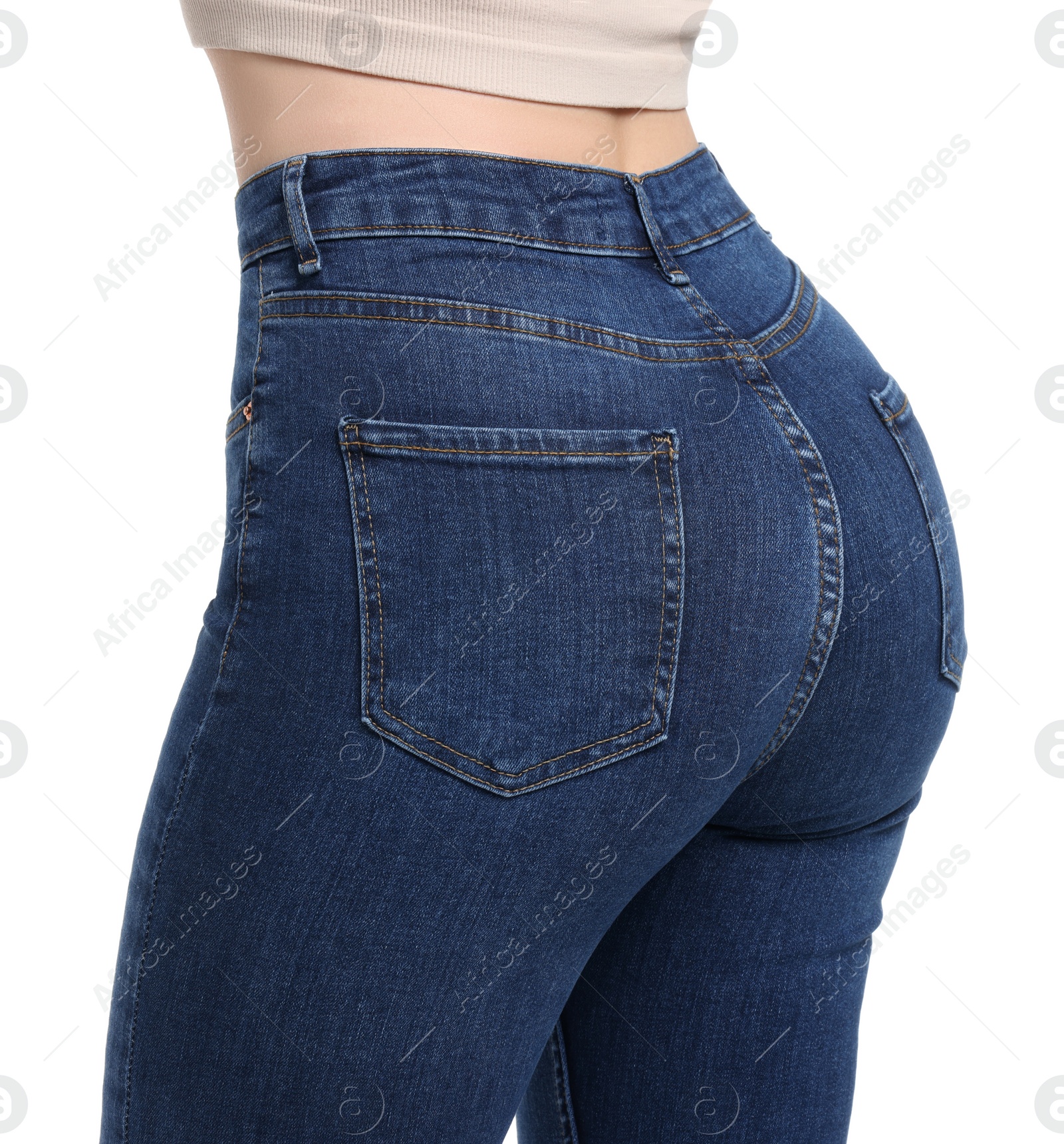 Photo of Woman in stylish jeans on white background, closeup