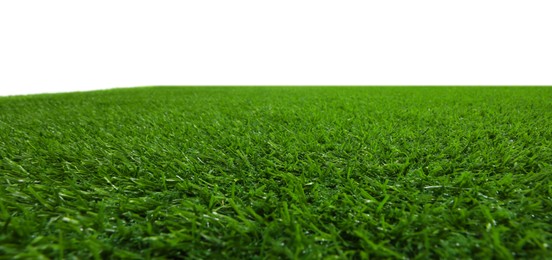 Photo of Green artificial grass surface isolated on white