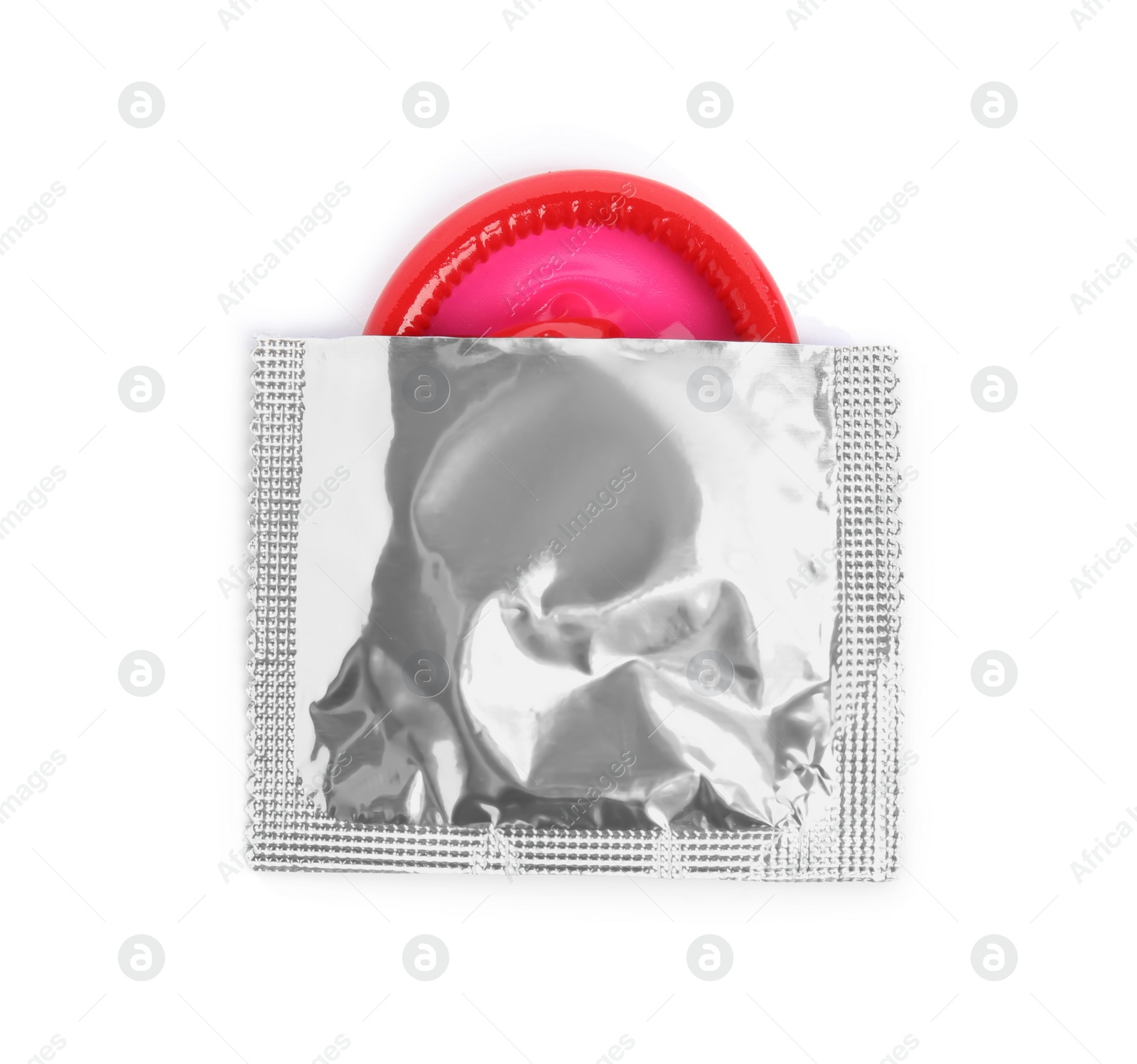 Photo of Torn condom package isolated on white, top view. Safe sex