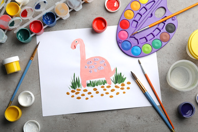 Photo of Flat lay composition with child's painting of dinosaur on grey table