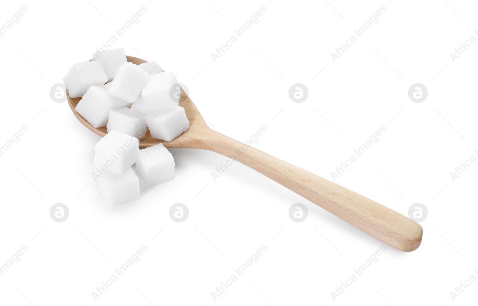 Photo of Many sugar cubes and wooden spoon isolated on white