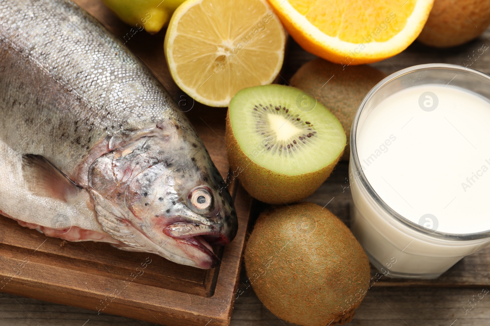 Photo of Allergenic food. Different fresh products on wooden table, closeup