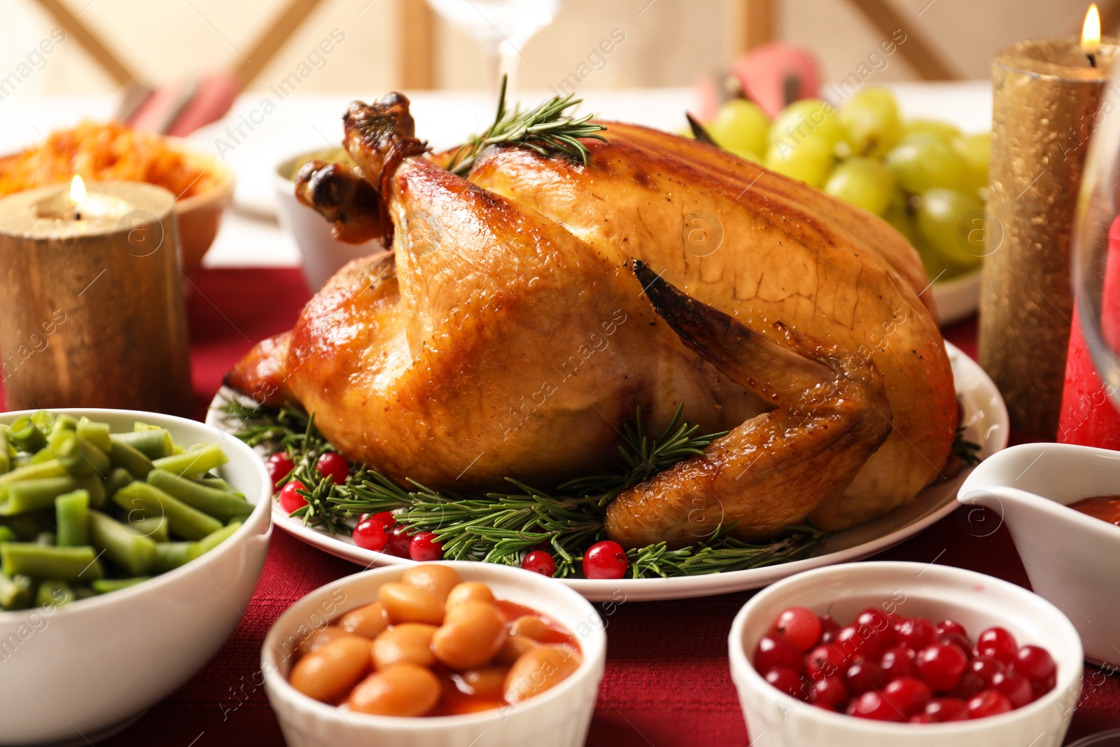 Photo of Traditional festive dinner with delicious roasted turkey served on table