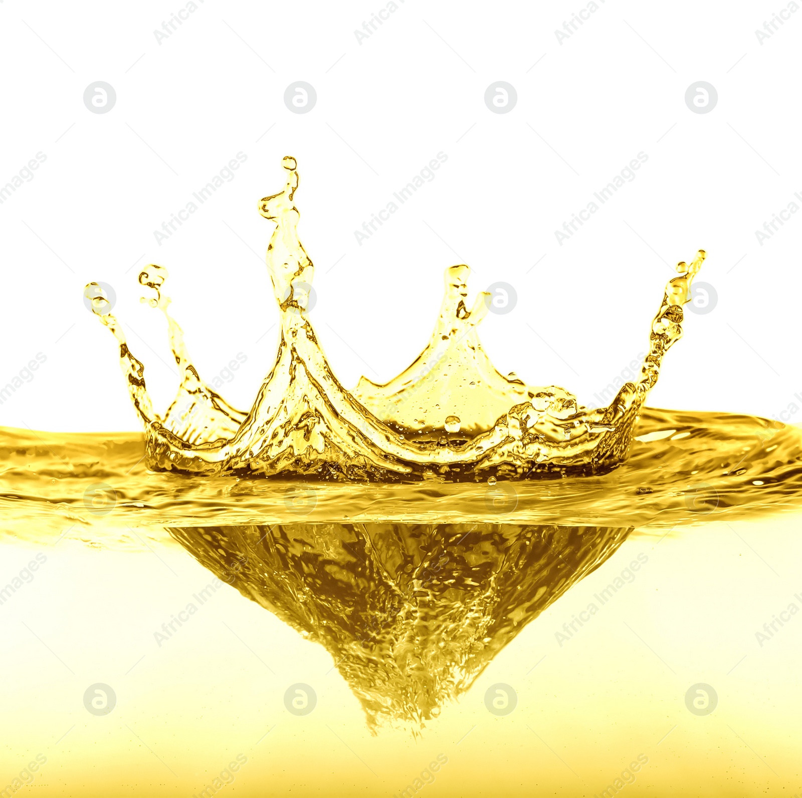 Image of Splash of natural cooking oil on white background