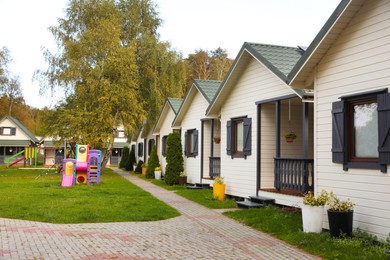 Photo of Beautiful cottage houses near playground. Real estate for rent