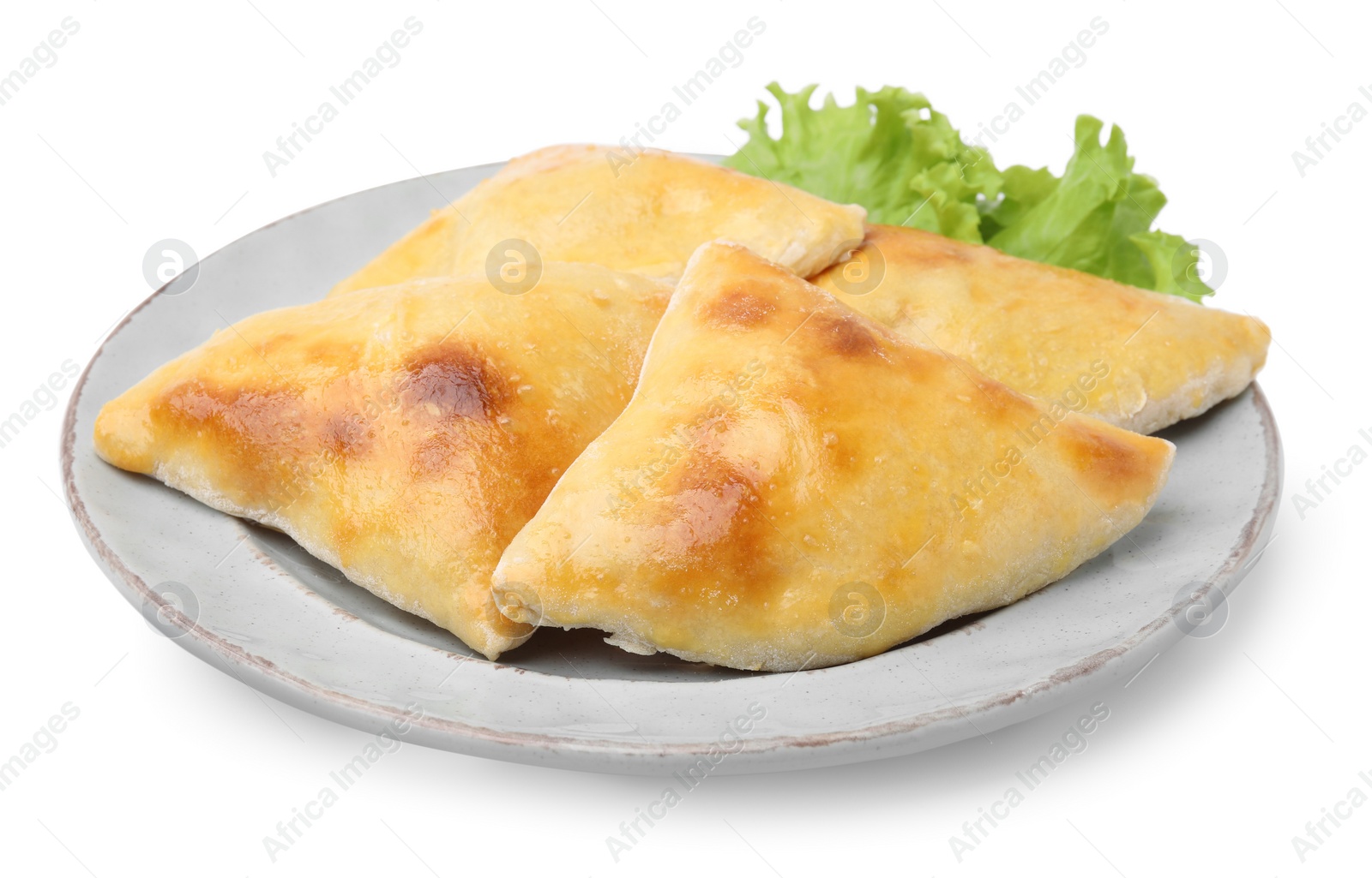 Photo of Delicious samosas and lettuce isolated on white