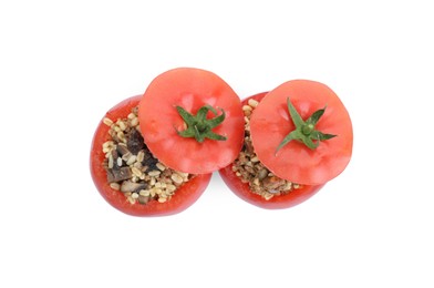 Photo of Delicious stuffed tomatoes with minced beef, bulgur and mushrooms isolated on white, top view