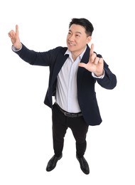 Photo of Businessman in suit posing on white background, above view