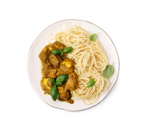 Photo of Delicious pasta and chicken with curry sauce isolated on white, top view