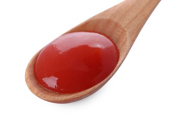 Photo of Wooden spoon with tasty fresh ketchup isolated on white
