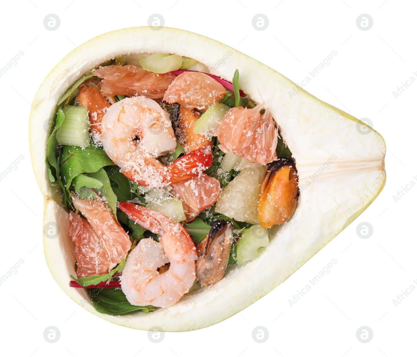 Photo of Delicious pomelo salad with shrimps in half of fruit isolated on white, top view