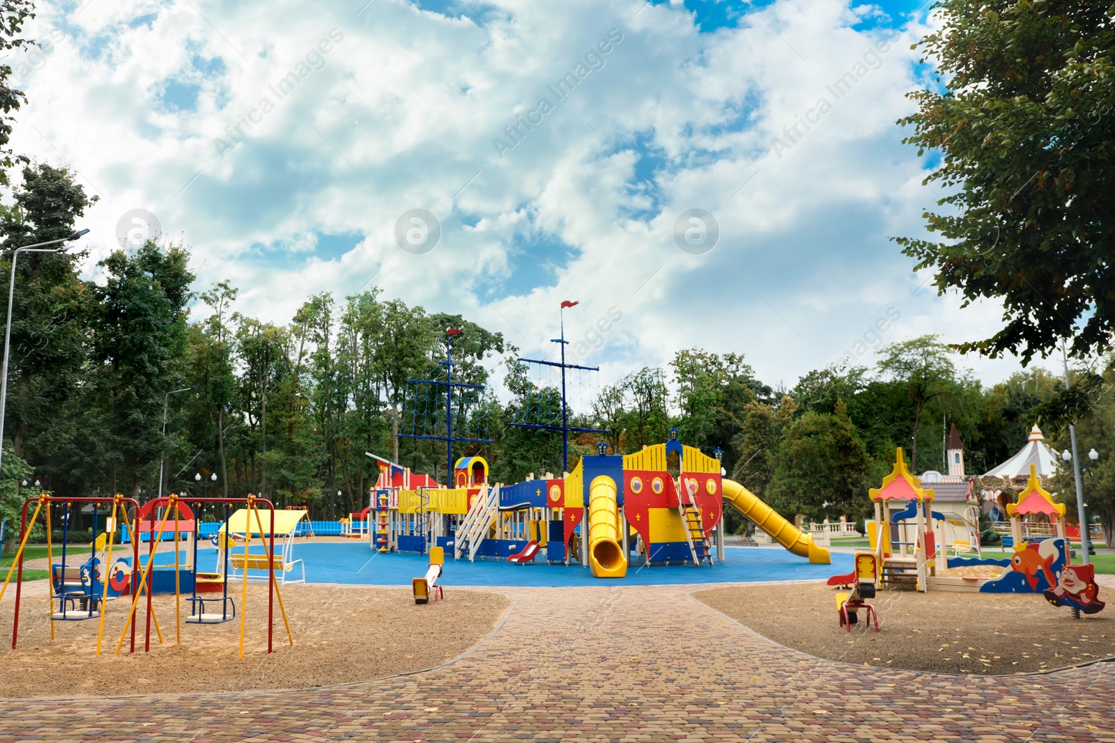 Photo of View of children's playground on autumn day