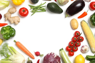 Photo of Frame made of different fresh vegetables on white background, top view. Space for text