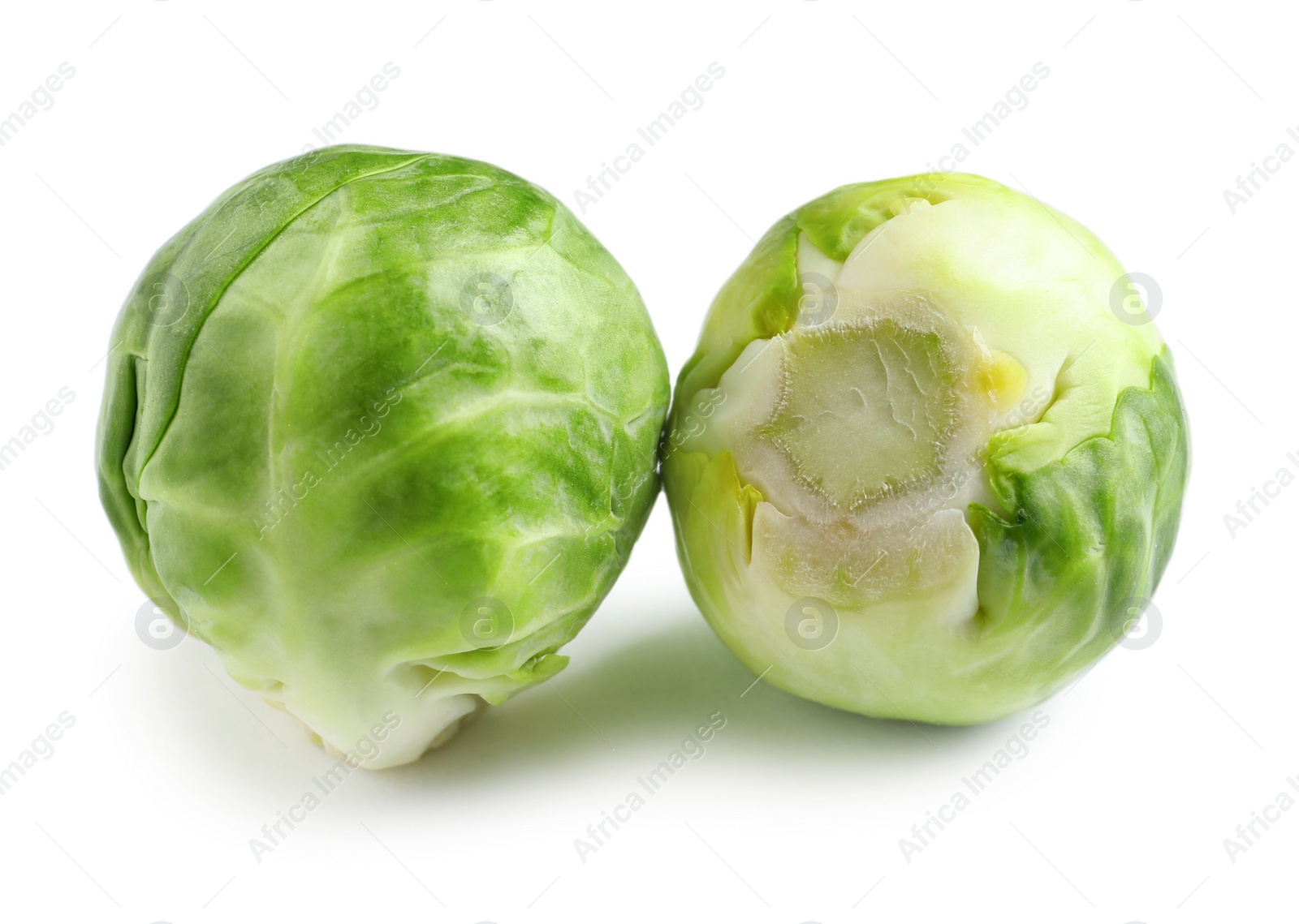 Photo of Fresh tasty Brussels sprouts on white background