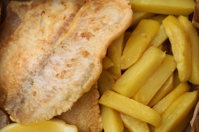 Photo of Delicious fish and chips as background, top view