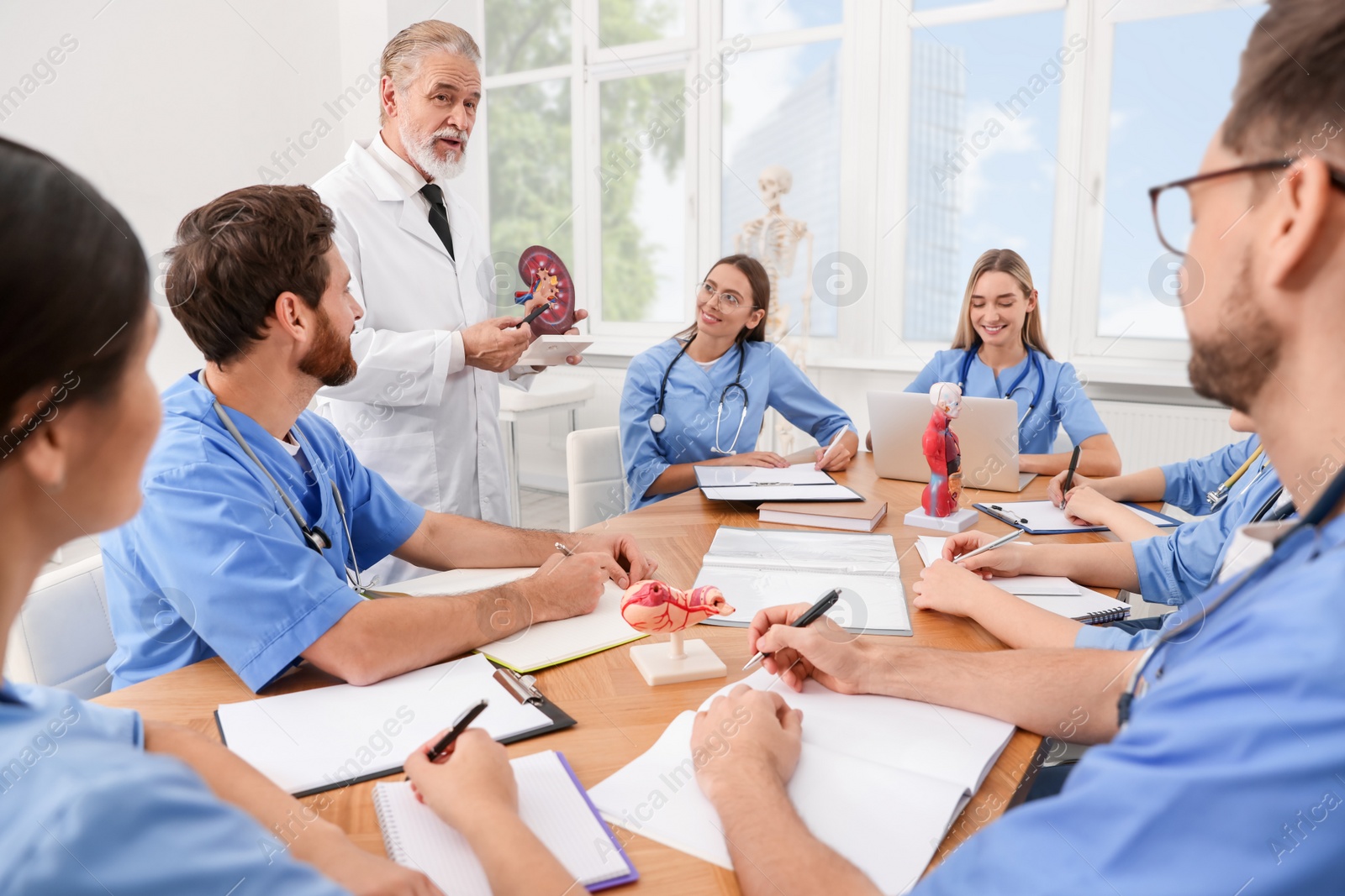 Photo of Doctor giving lecture for interns in university