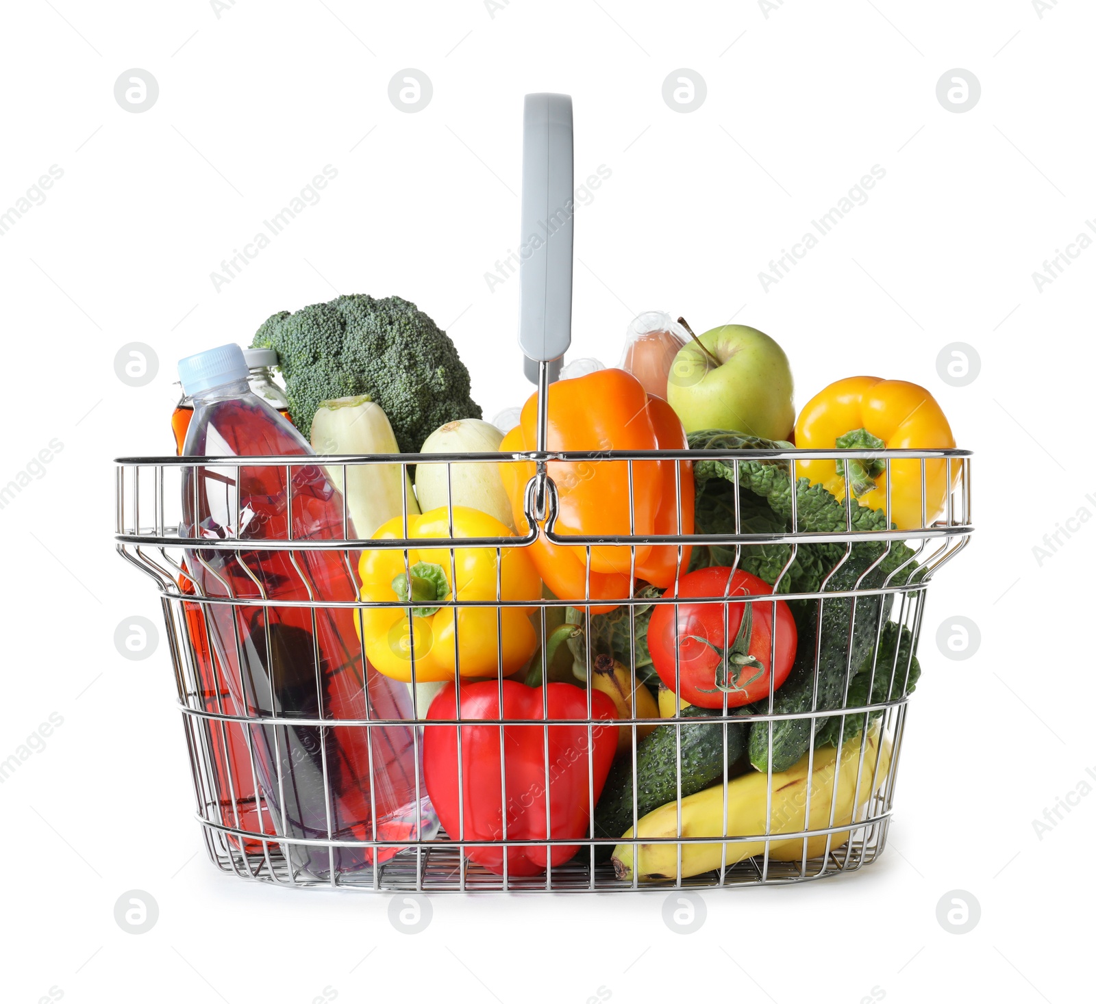 Photo of Shopping basket with grocery products on white background