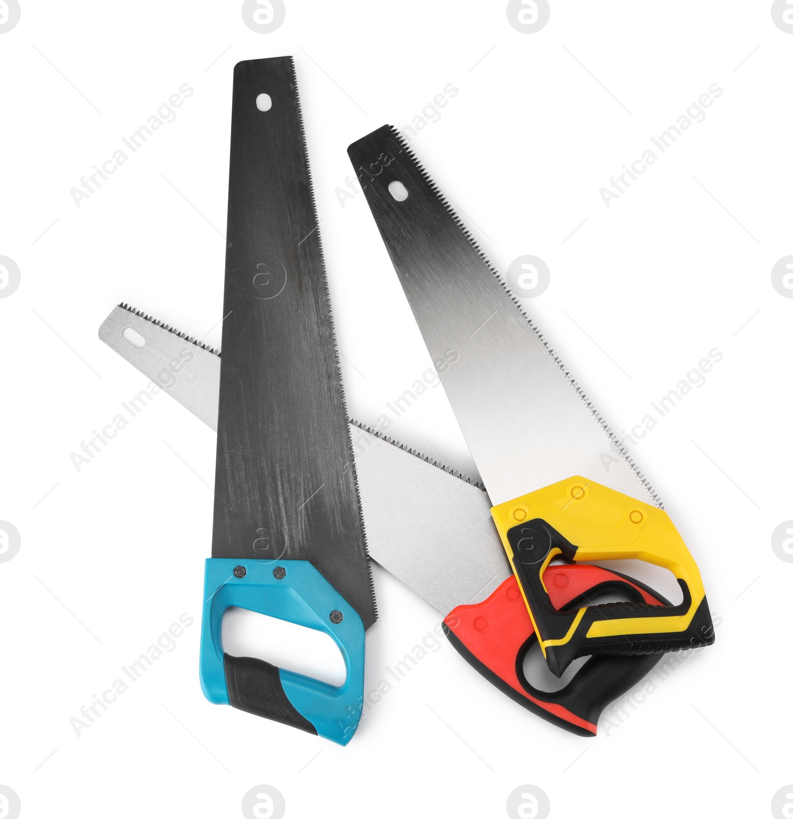 Photo of Saws with colorful handles isolated on white, top view
