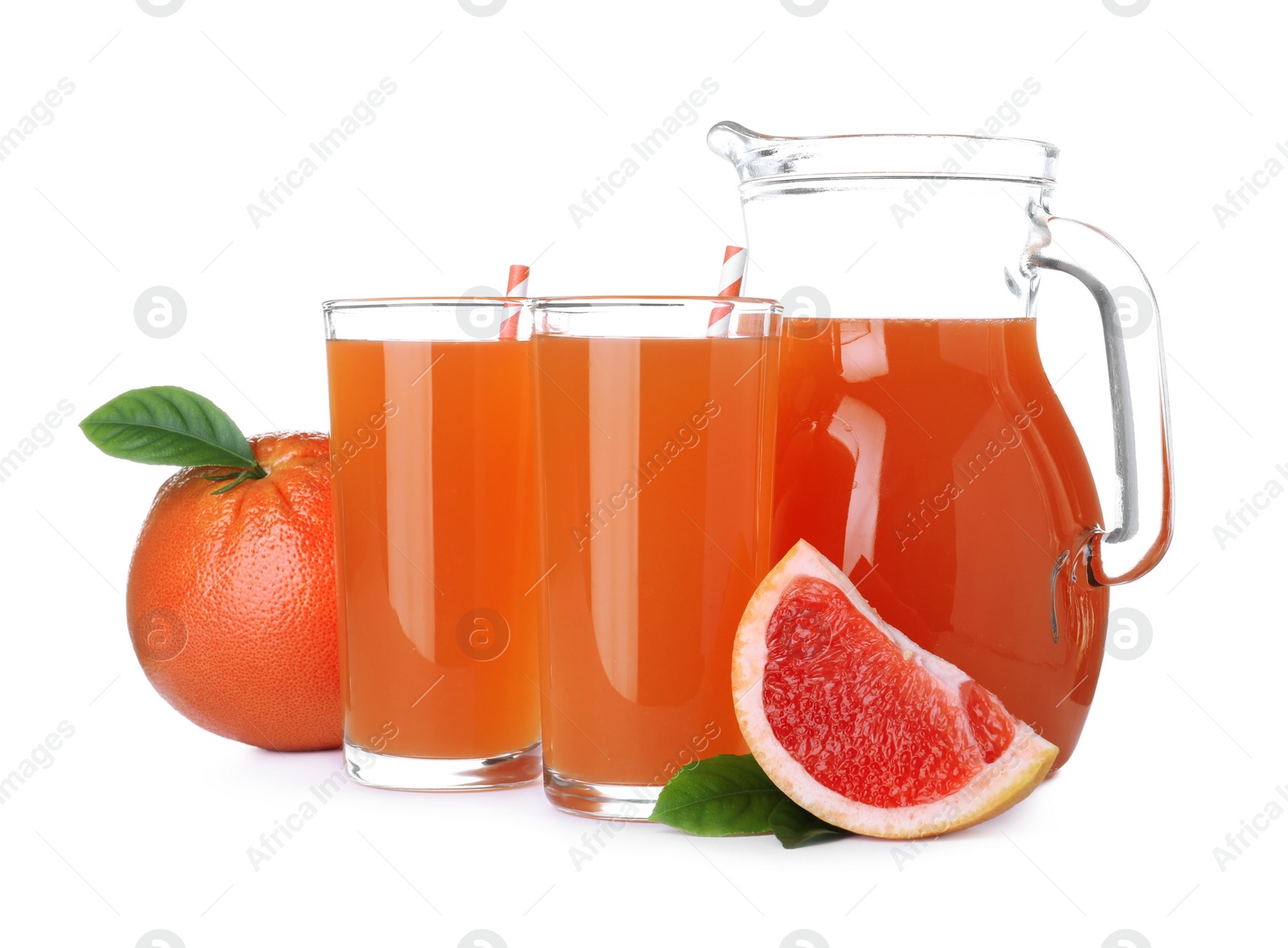 Photo of Tasty freshly made grapefruit juice and fruits on white background