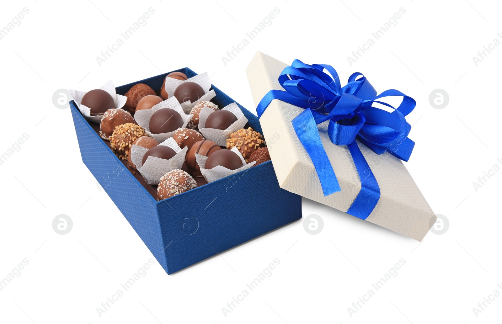 Photo of Box with delicious chocolate candies isolated on white