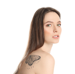 Young woman with beautiful tattoo of butterfly on her body against white background