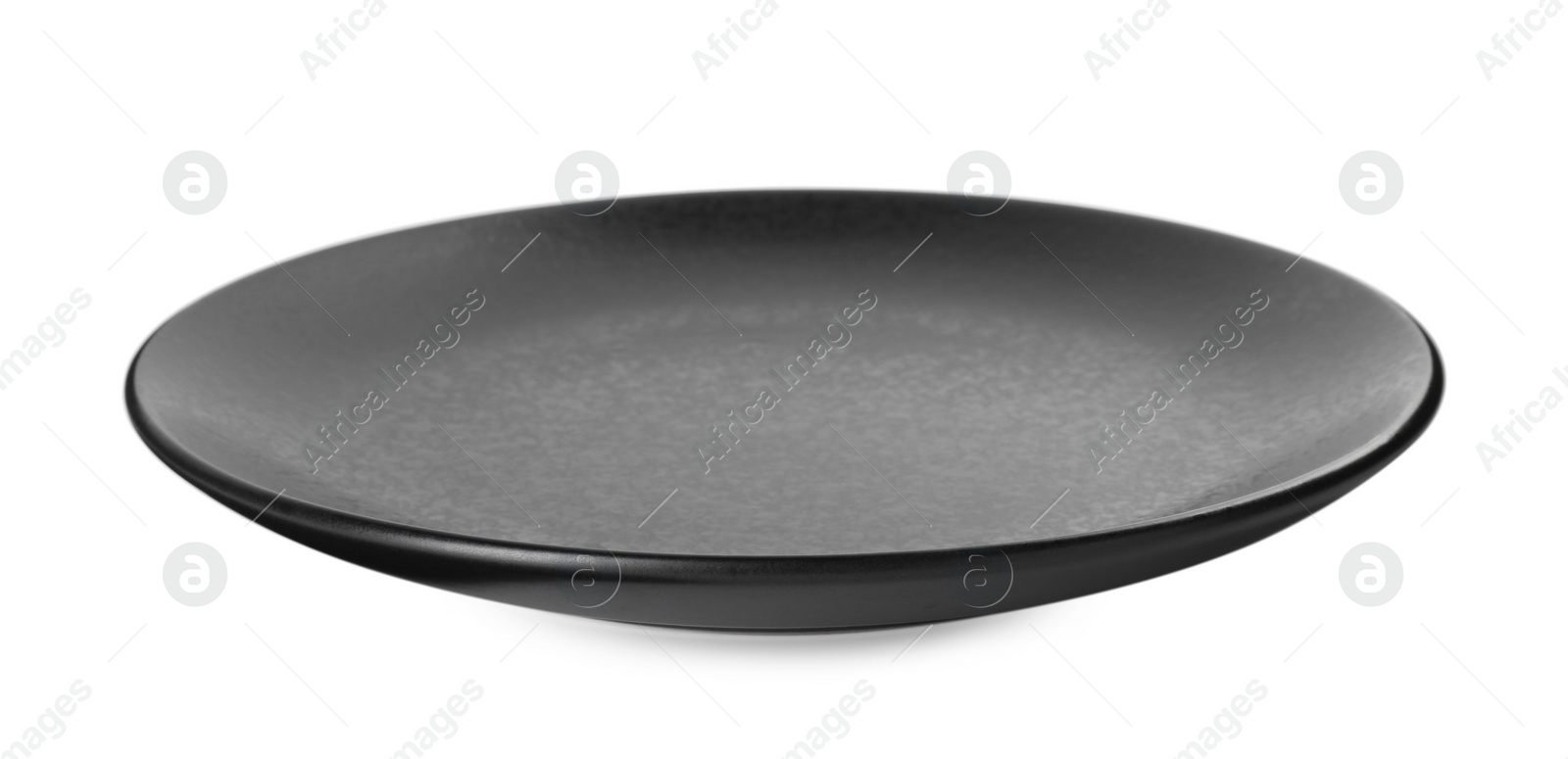 Photo of One beautiful black plate isolated on white