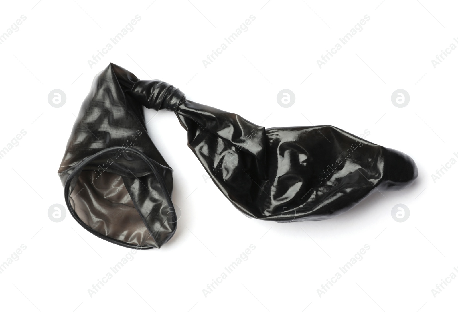 Photo of Black used condom on white background. Safe sex concept