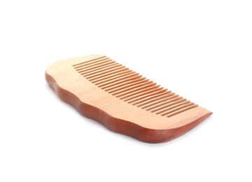 Photo of New wooden hair comb isolated on white