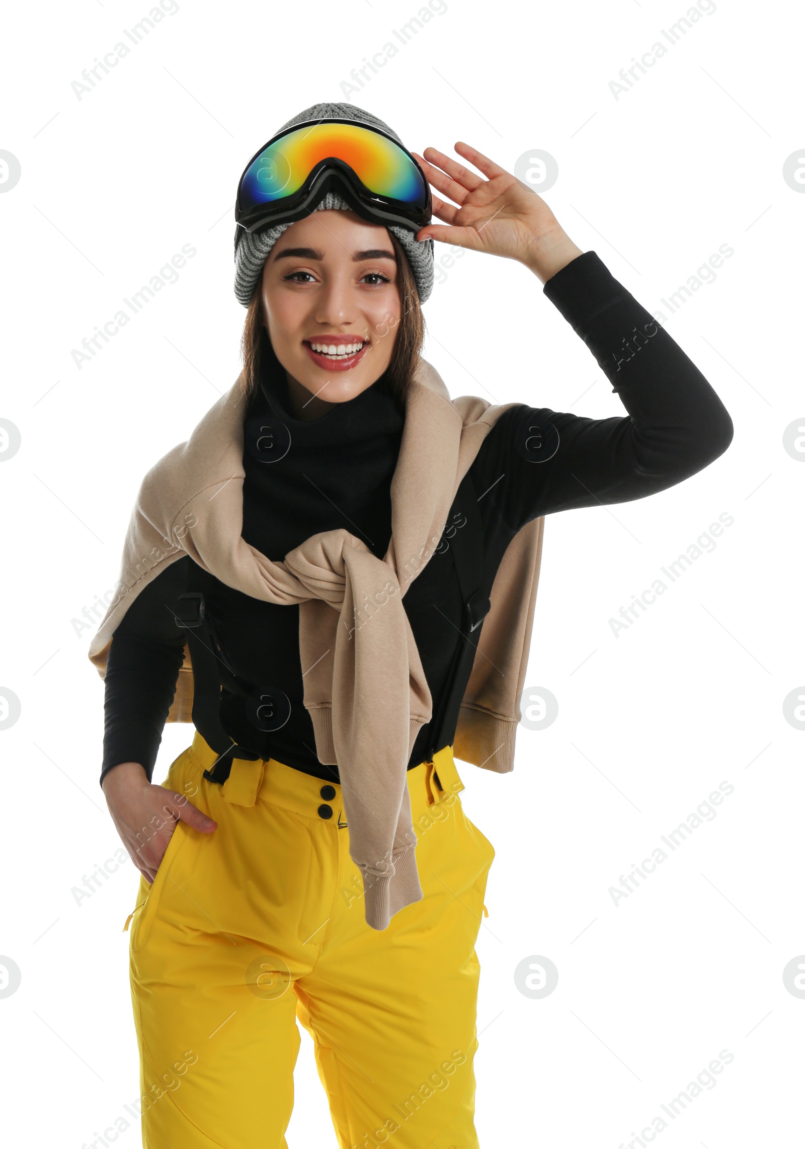 Photo of Woman wearing stylish winter sport clothes on white background