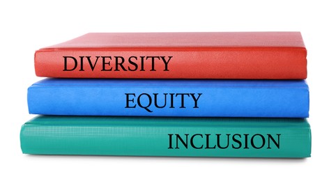 Image of Stack of colorful notebooks with words Diversity, Equity, Inclusion on white background