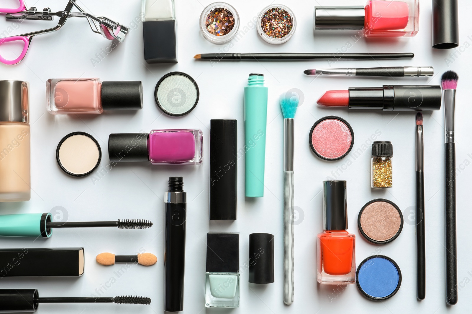 Photo of Flat lay composition with decorative cosmetics on white background