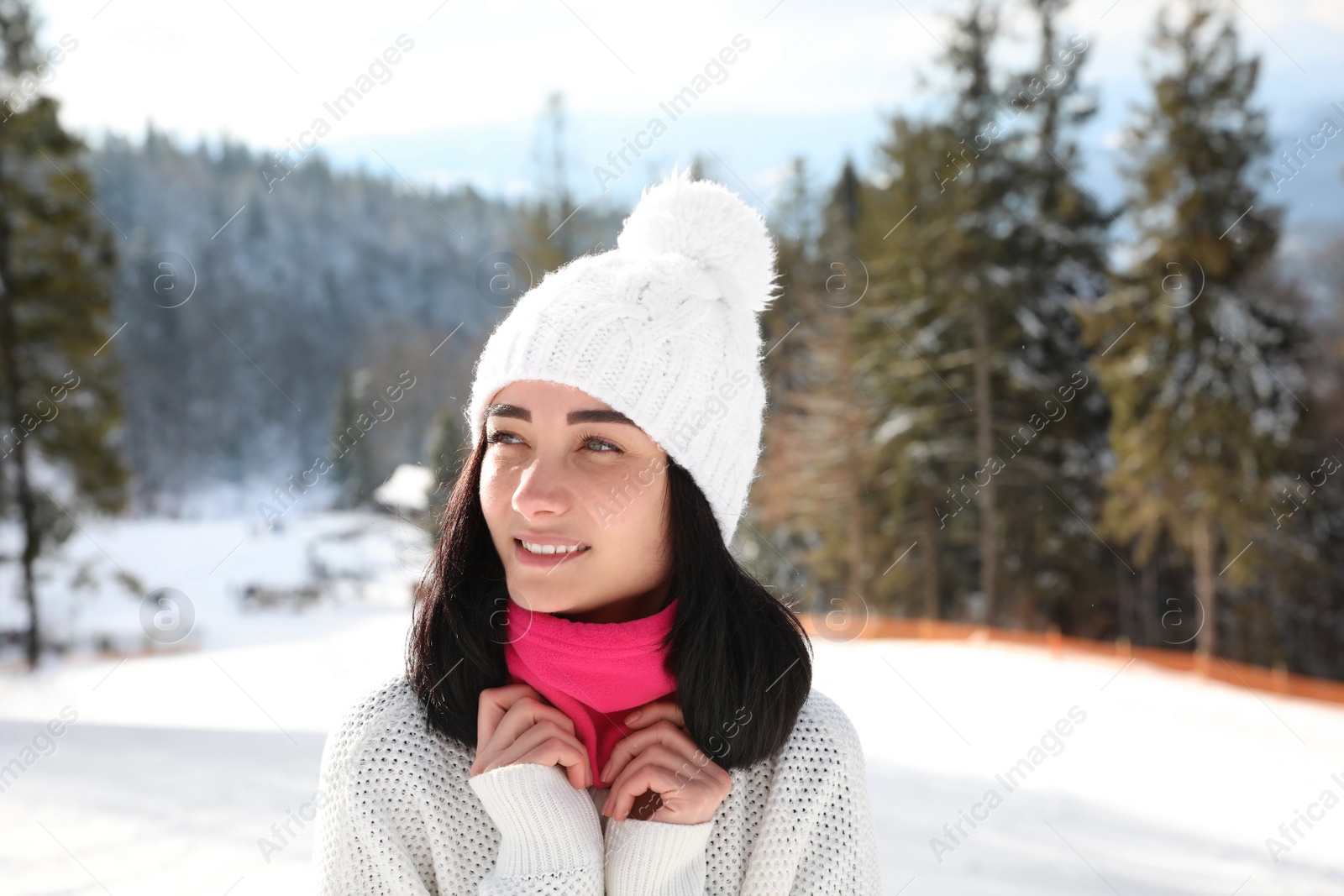 Photo of Young woman at mountain resort. Winter vacation