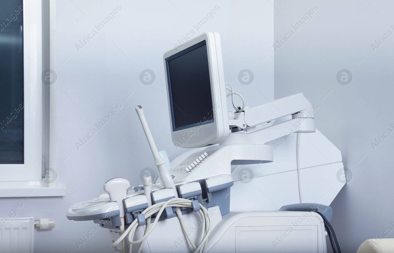 Photo of Modern ultrasound machine in office. Diagnostic technique