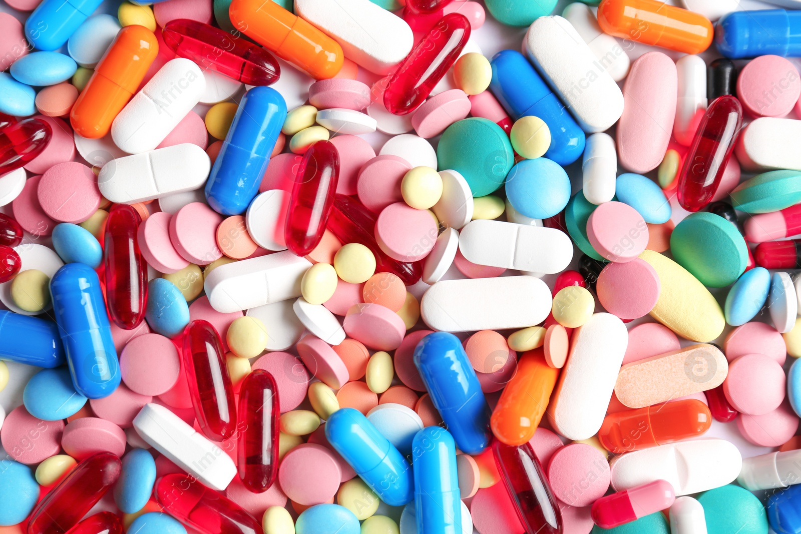 Photo of Many colorful pills as background