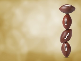 Image of Stack of American football balls on gold background. Space for text