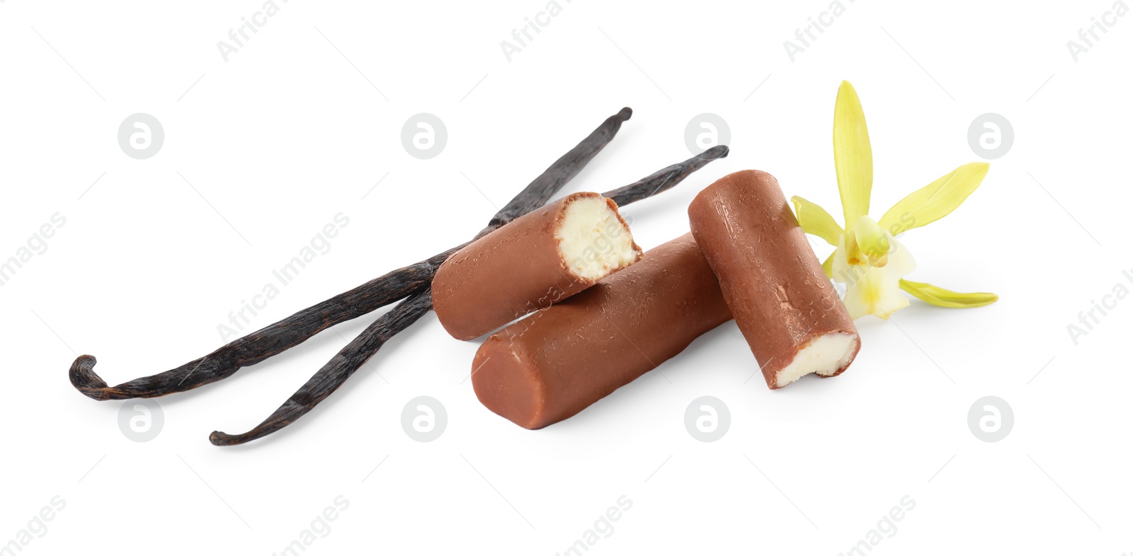 Photo of Glazed curd cheese bars, vanilla pods and flower isolated on white